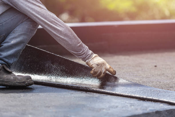 Professional Basement Waterproofing technician working in Lakewood, NJ